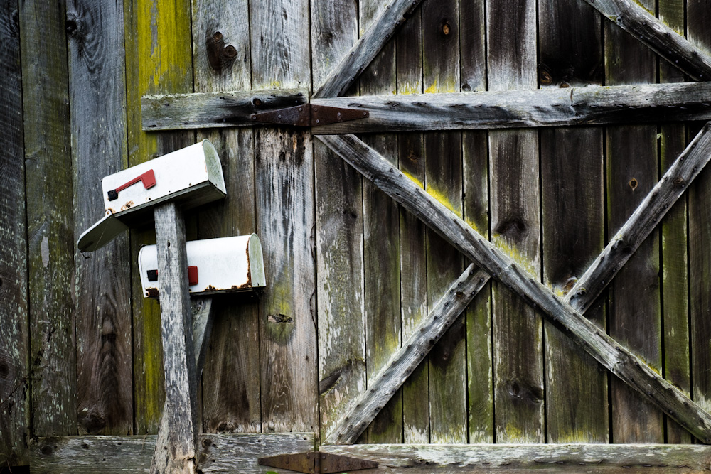 Mailboxes on a wooden door